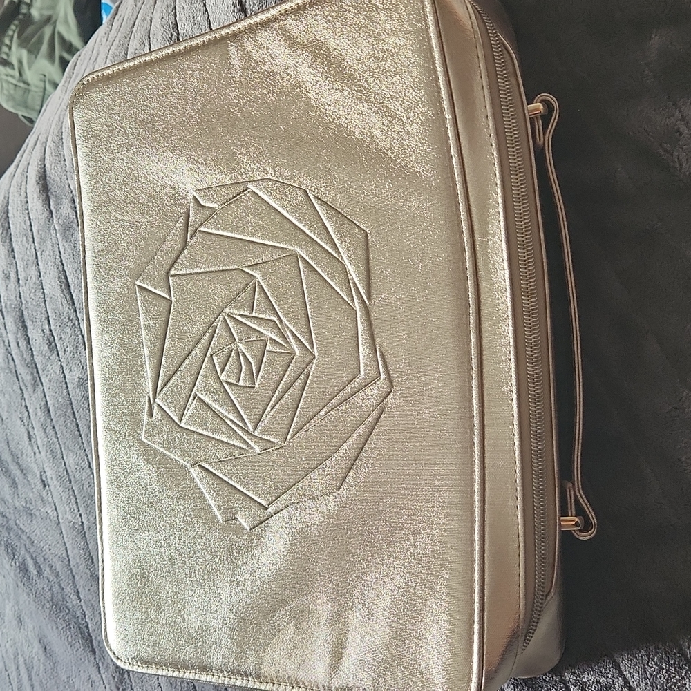 gold lancome bag